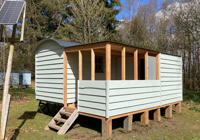 shepherds hut with veranda front and side